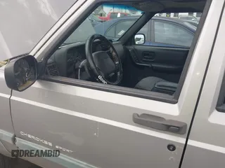 2000 Jeep Cherokee with VIN 1J4FF48S7YL220827, listed as a IAAI auction lot 42871669 with 146,466 mi miles and . Bid and sale history available at DreamBid. Image 6.
