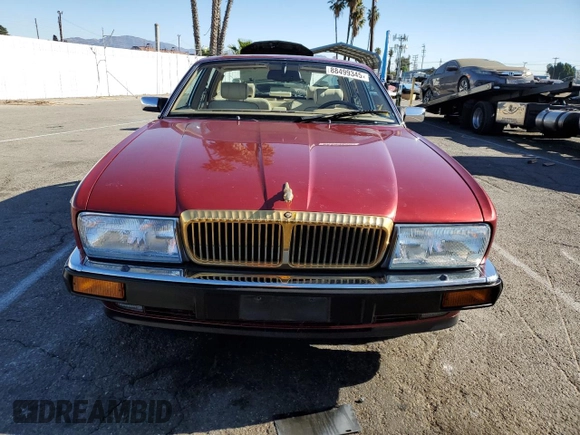 1994 Jaguar XJ with VIN SAJKX1747RC690894, listed as a Copart auction lot 88499345 with 24,006 mi miles and Clean Title. Bid and sale history available at DreamBid. Image 5.