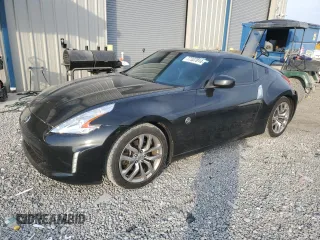 2013 Nissan 370Z Touring z VIN JN1AZ4EH4DM380137, wystawiony jako Copart lot #77337014 z przebiegiem 140 775 mil mil oraz Szkoda całkowita • Salvage title. Historia ofert i sprzedaży dostępna na DreamBid. Obrazek 1.