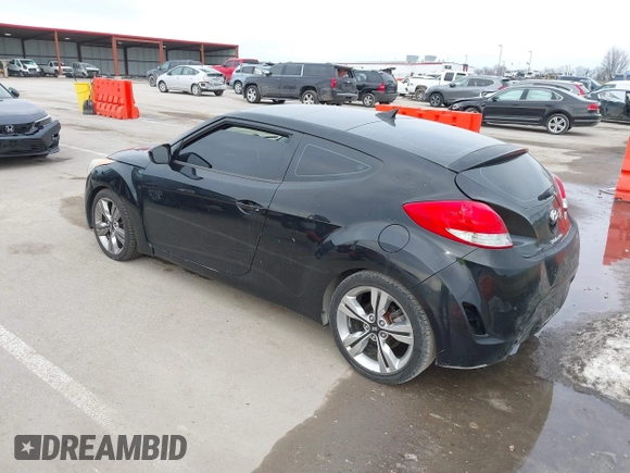 2013 Hyundai Veloster w/Black Int z VIN KMHTC6ADXDU149793, wystawiony jako IAAI lot #41537953 z przebiegiem 117 635 mil mil oraz . Historia ofert i sprzedaży dostępna na DreamBid. Obrazek 3.