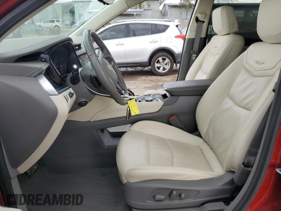 2024 Cadillac XT6 FWD Premium Luxury with VIN 1GYKPCRS1RZ700168, listed as a Copart auction lot 59327055 with 21,001 mi miles and Salvage title. Bid and sale history available at DreamBid. Image 7.