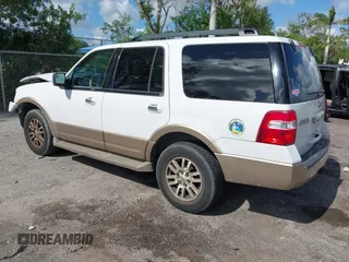 2014 Ford Expedition King Ranch with VIN 1FMJU1J50EEF14445, listed as a IAAI auction lot 42571073 with 125,174 mi miles and . Bid and sale history available at DreamBid. Image 3.