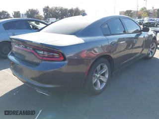 2017 Dodge Charger SXT with VIN 2C3CDXHG9HH643325, listed as a IAAI auction lot 41681070 with 79,427 mi miles. Bid and sale history available at carsss.com. Image 4.