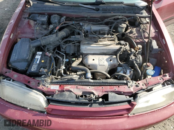 1996 Honda Accord LX with VIN 1HGCD563XTA266206, listed as a Copart auction lot 48601005 with 302,329 mi miles and Salvage Title. Bid and sale history available at DreamBid. Image 11.