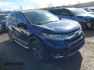 2017 Honda CR-V Touring z VIN 2HKRW2H96HH631869, wystawiony jako IAAI lot #41408499 z przebiegiem 36 295 mil mil oraz . Historia ofert i sprzedaży dostępna na DreamBid. Obrazek 1.