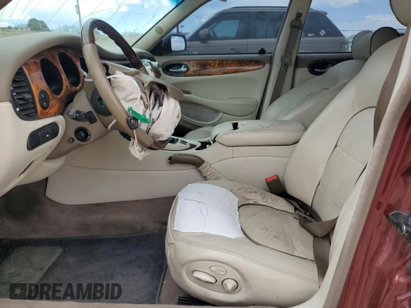 1998 Jaguar XJ Vanden Plas with VIN SAJKX6245WC830912, listed as a Copart auction lot 49717285 with 127,509 mi miles and Salvage Title. Bid and sale history available at DreamBid. Image 7.