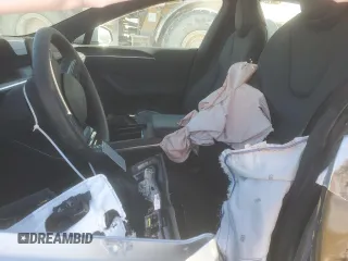 2024 Tesla Model S с VIN 5YJSA1E56RF541102, выставлен на аукционе Copart как лот 42584275 с пробегом Не указан миль и Списание • Salvage title. История ставок и продаж доступна на DreamBid. Изображение 7.