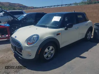 2016 MINI Hardtop 4 Door with VIN WMWXU1C56G2D10605, listed as a IAAI auction lot 42411431 with 35,367 mi miles and . Bid and sale history available at DreamBid. Image 16.