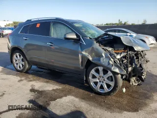 2013 Cadillac SRX Performance Collection with VIN 3GYFNDE39DS568052, listed as a Copart auction lot 52027255 with 96,579 mi miles and Salvage Title. Bid and sale history available at carsss.com. Image 4.