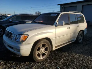 1999 Lexus LX 470 with VIN JT6HT00WXX0056382, listed as a Copart auction lot 43045035 with 238,727 mi miles and Clean Title. Bid and sale history available at DreamBid. Image 1.