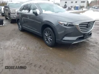 2021 Mazda CX-9 Touring with VIN JM3TCBCY4M0502895, listed as a IAAI auction lot 41476053 with 101,025 mi miles. Bid and sale history available at carsss.com. Image 1.
