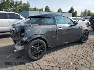 2012 MINI Coupe z VIN WMWSX1C57CT163911, wystawiony jako Copart lot #65001404 z przebiegiem 101 939 mil mil oraz Szkody całkowita. Historia ofert i sprzedaży dostępna na DreamBid. Obrazek 3.