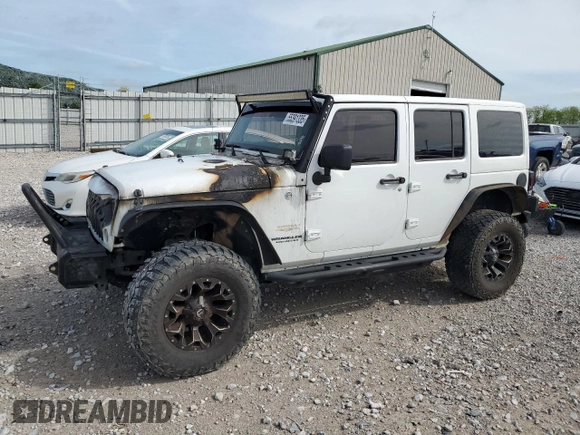 2014 Jeep Wrangler Unlimited Sahara z VIN 1C4BJWEG9EL102336, wystawiony jako Copart lot #55391335 z przebiegiem Nie podano mil oraz Szkoda całkowita • Salvage title. Historia ofert i sprzedaży dostępna na DreamBid. Obrazek 1.