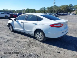 2014 Ford Fusion S with VIN 1FA6P0G71E5384783, listed as a IAAI auction lot 40868527 with 207,354 mi miles. Bid and sale history available at carsss.com. Image 3.