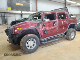 2005 Hummer H2 SUT with VIN 5GRGN22U95H111052, listed as a Copart auction lot 84993604 with 0 mi miles and Salvage Title. Bid and sale history available at carsss.com. Image 1.