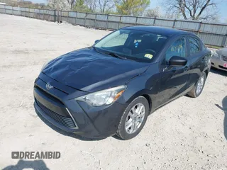 2016 Scion iA with VIN 3MYDLBZV3GY131783, listed as a IAAI auction lot 41999144 with 197,827 mi miles. Bid and sale history available at carsss.com. Image 2.