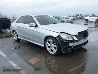 2013 Mercedes-Benz E-Class E 350 Luxury with VIN WDDHF8JB1DA720607, listed as a IAAI auction lot 41514018 with 135,926 mi miles. Bid and sale history available at carsss.com. Image 1.
