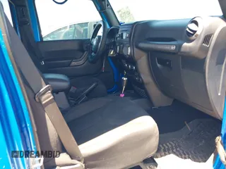 2016 Jeep Wrangler Unlimited Sport with VIN 1C4BJWDG2GL296485, listed as a IAAI auction lot 42177026 with 113,971 mi miles and . Bid and sale history available at DreamBid. Image 5.