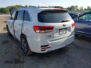 2016 Kia Sorento SX with VIN 5XYPKDA51GG072940, listed as a IAAI auction lot 42017504 with 110,897 mi miles. Bid and sale history available at carsss.com. Image 3.