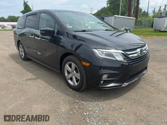 2019 Honda Odyssey EX-L z VIN 5FNRL6H78KB125979, wystawiony jako Copart lot #59495705 z przebiegiem 199 380 mil mil oraz Czysty tytuł • Clean title. Historia ofert i sprzedaży dostępna na DreamBid. Obrazek 1.