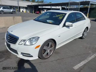 2012 Mercedes-Benz E-Class E 350 Luxury with VIN WDDHF8JB2CA619686, listed as a IAAI auction lot 42079521 with 129,025 mi miles. Bid and sale history available at carsss.com. Image 18.