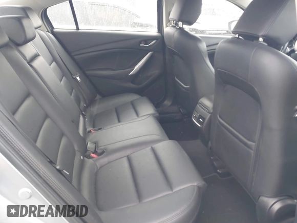 2014 Mazda 6 i Touring with VIN JM1GJ1V60E1141831, listed as a IAAI auction lot 42131200 with 86,597 mi miles and . Bid and sale history available at DreamBid. Image 8.