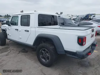 2022 Jeep Gladiator Rubicon with VIN 1C6JJTBG9NL113990, listed as a IAAI auction lot 38583176 with 31,520 mi miles. Bid and sale history available at carsss.com. Image 3.