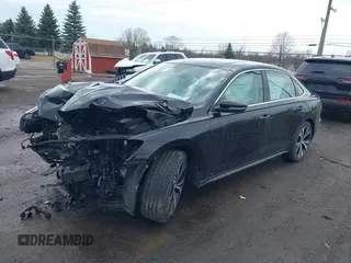 2021 Volkswagen Passat SE z VIN 1VWSA7A36MC014185, wystawiony jako IAAI lot #41915701 z przebiegiem 175 043 mil mil oraz . Historia ofert i sprzedaży dostępna na DreamBid. Obrazek 2.
