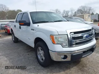 2014 Ford F-150 XL with VIN 1FTFW1CT5EKD39904, listed as a IAAI auction lot 41797099 with 209,343 mi miles. Bid and sale history available at carsss.com. Image 1.