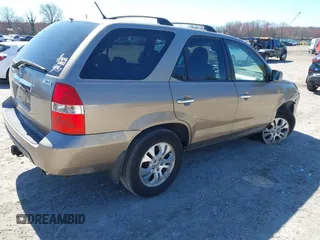 2003 Acura MDX Touring Pkg with VIN 2HNYD18623H549599, listed as a IAAI auction lot 41879934 with 242,896 mi miles. Bid and sale history available at carsss.com. Image 4.
