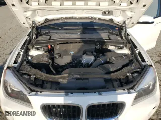2015 BMW X1 sDrive28i with VIN WBAVM1C57FV498116, listed as a Copart auction lot 52107255 with 82,895 mi miles and Salvage Title. Bid and sale history available at carsss.com. Image 11.