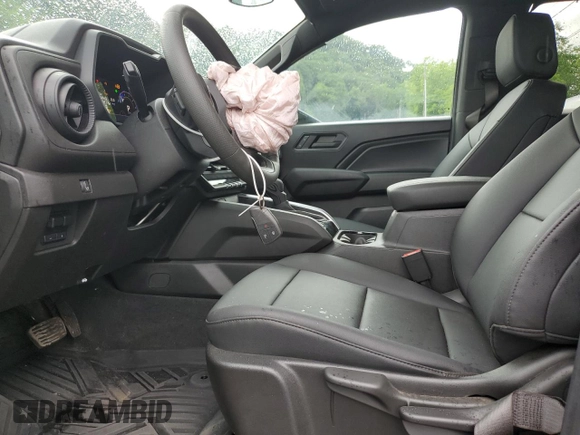 2024 Chevrolet Colorado 4WD Trail Boss with VIN 1GCPTEEK5R1271947, listed as a Copart auction lot 61806975 with 7,454 mi miles and Salvage title. Bid and sale history available at DreamBid. Image 7.