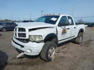 2005 Dodge Ram 3500 SLT with VIN 3D7LS38CX5G754202, listed as a IAAI auction lot 41831566 with 225,847 mi miles. Bid and sale history available at carsss.com. Image 2.