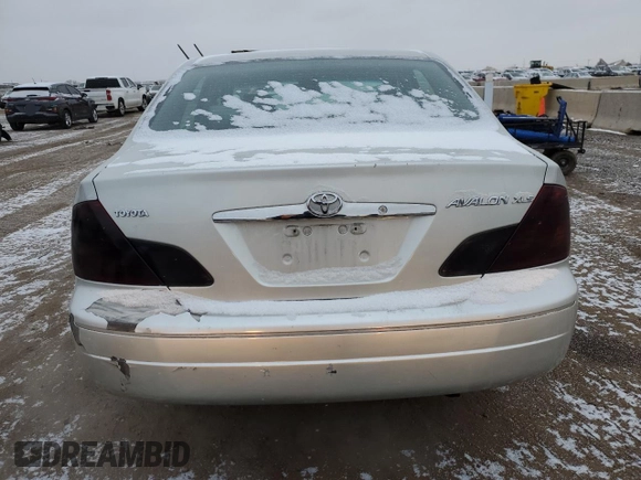 2001 Toyota Avalon XL z VIN 4T1BF28B01U138751, wystawiony jako Copart lot #44849165 z przebiegiem 225 082 mil mil oraz Tytuł czysty. Historia ofert i sprzedaży dostępna na DreamBid. Obrazek 6.