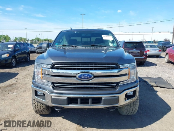 2018 Ford F-150 XL with VIN 1FTEW1EG1JFC91543, listed as a IAAI auction lot 42307775 with 102,055 mi miles and . Bid and sale history available at DreamBid. Image 12.