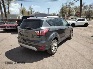 2017 Ford Escape Titanium with VIN 1FMCU9JD0HUC09357, listed as a Copart auction lot 52772915 with 99,062 mi miles and Clean Title. Bid and sale history available at carsss.com. Image 4.