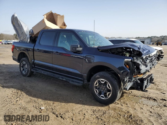 2022 Ford F-150 Lightning Pro с VIN 1FTVW1EL6NWG04931, выставлен на аукционе Copart как лот 43184675 с пробегом 26 616 миль миль и Списание • Salvage title. История ставок и продаж доступна на DreamBid. Изображение 4.