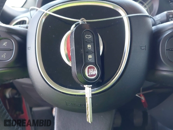 2015 FIAT 500L Urbana Trekking with VIN ZFBCFADH8FZ034079, listed as a IAAI auction lot 42437851 with 54,216 mi miles and . Bid and sale history available at DreamBid. Image 11.