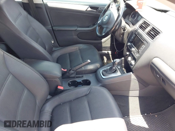 2012 Volkswagen Jetta TDI w/Premium with VIN 3VWLL7AJ1CM307485, listed as a IAAI auction lot 42384300 with 118,958 mi miles and . Bid and sale history available at DreamBid. Image 5.