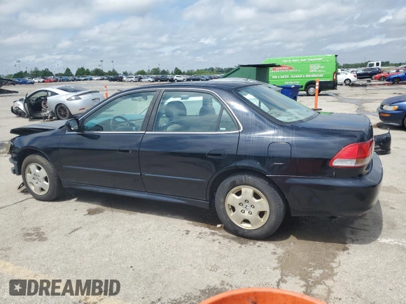 2002 Honda Accord EX z VIN 1HGCG16582A057594, wystawiony jako Copart lot #54874665 z przebiegiem 173 709 mil mil oraz Szkoda całkowita • Salvage title. Historia ofert i sprzedaży dostępna na DreamBid. Obrazek 2.
