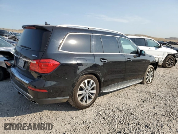 2014 Mercedes-Benz GL 450 z VIN 4JGDF7CE4EA419210, wystawiony jako Copart lot #61794925 z przebiegiem 92 509 mil mil oraz Szkoda całkowita • Salvage title. Historia ofert i sprzedaży dostępna na DreamBid. Obrazek 3.