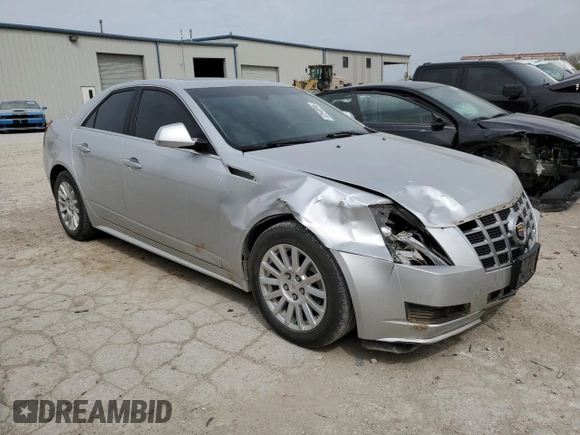 2013 Cadillac CTS Luxury with VIN 1G6DH5E58D0175326, listed as a Copart auction lot 52646985 with 142,473 mi miles and Salvage title. Bid and sale history available at DreamBid. Image 4.