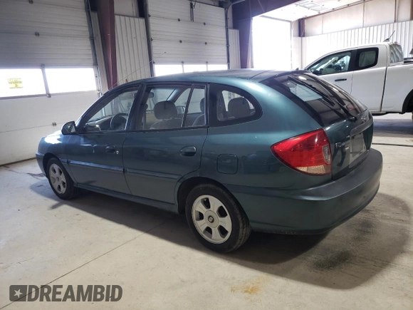 2004 Kia Rio with VIN KNADC165846199316, listed as a Copart auction lot 51158965 with 158,978 mi miles and Salvage Title. Bid and sale history available at carsss.com. Image 2.