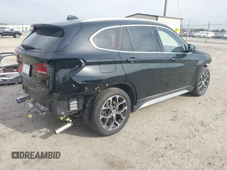 2021 BMW X1 xDrive28i with VIN WBXJG9C05M5T83784, listed as a IAAI auction lot 41696073 with 15,865 mi miles and . Bid and sale history available at DreamBid. Image 4.