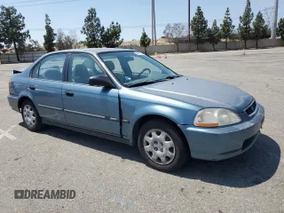 1998 Honda Civic DX with VIN JHMEJ6624WS000450, listed as a Copart auction lot 54217265 with 299,994 mi miles and Salvage Title. Bid and sale history available at carsss.com. Image 4.