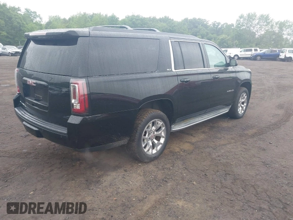 2015 GMC Yukon XL SLT z VIN 1GKS2HKC1FR146778, wystawiony jako IAAI lot #42449315 z przebiegiem 197 577 mil mil oraz . Historia ofert i sprzedaży dostępna na DreamBid. Obrazek 4.
