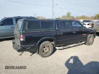 2003 GMC Sonoma SLS with VIN 1GTDT13X43K101767, listed as a Copart auction lot 76805334 with 248,776 mi miles and Salvage Title. Bid and sale history available at carsss.com. Image 3.