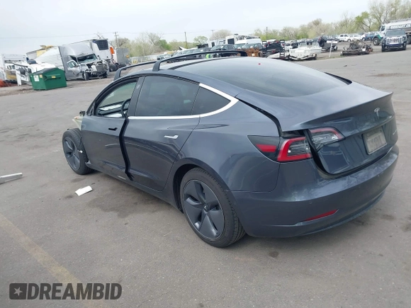 2020 Tesla Model 3 Long Range with VIN 5YJ3E1EB1LF639055, listed as a IAAI auction lot 42048009 with 43,493 mi miles. Bid and sale history available at carsss.com. Image 3.