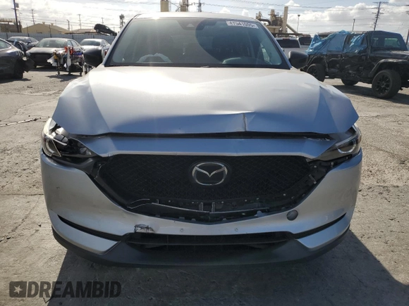 2019 Mazda CX-5 Touring with VIN JM3KFACMXK1556090, listed as a Copart auction lot 47541005 with 82,030 mi miles and Salvage Title. Bid and sale history available at carsss.com. Image 5.