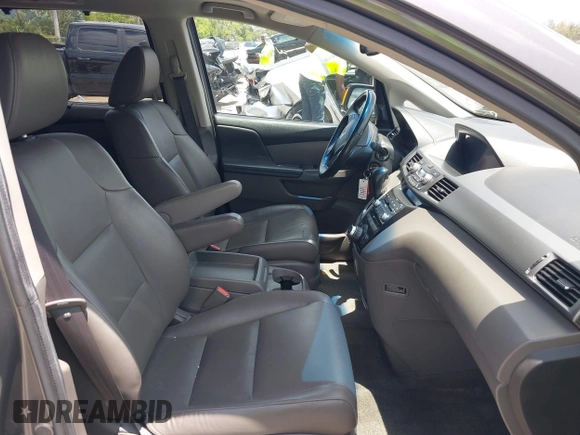 2013 Honda Odyssey Touring with VIN 5FNRL5H96DB068843, listed as a IAAI auction lot 42312176 with 115,804 mi miles and . Bid and sale history available at DreamBid. Image 5.